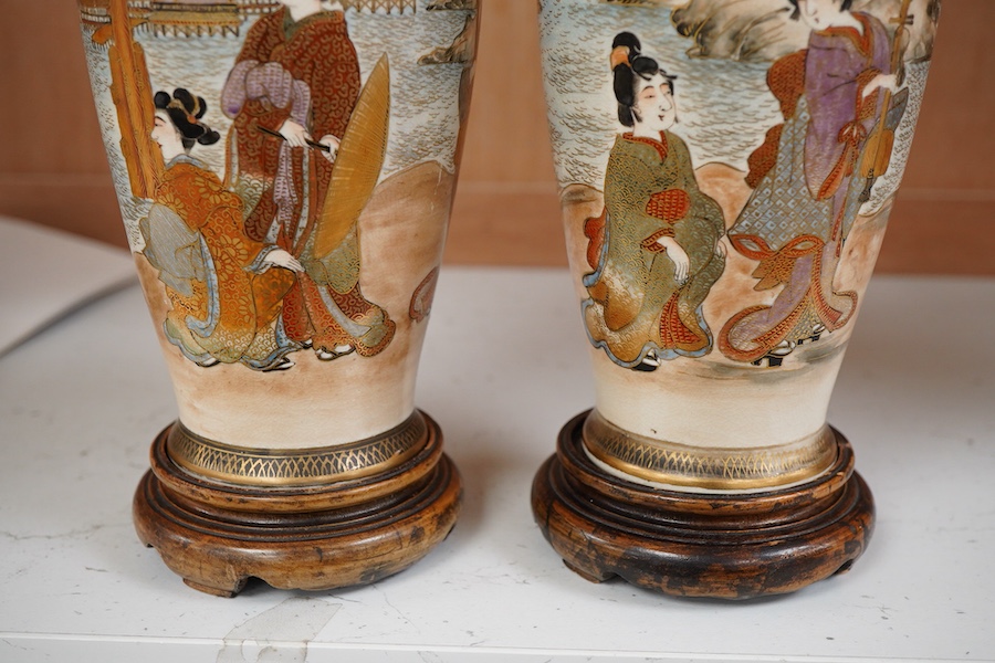 A pair of Japanese satsuma vases and stands, signed, Meiji period (1868-1912), 21cm total